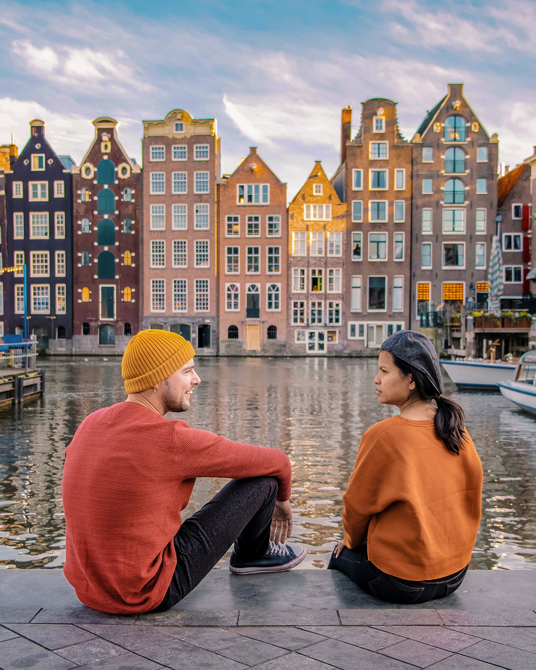 Amsterdam’s colorful canal houses showcasing the relaxed rhythm of the city.
